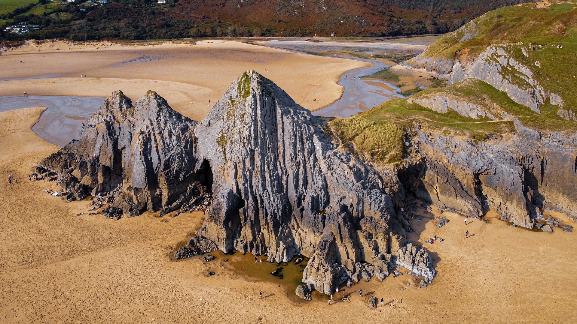 Three Cliffs Bay in Swansea is one of the Best British Beaches for Families To Visit This Summer